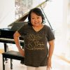 A woman wearing inspirational bra-free T-shirt